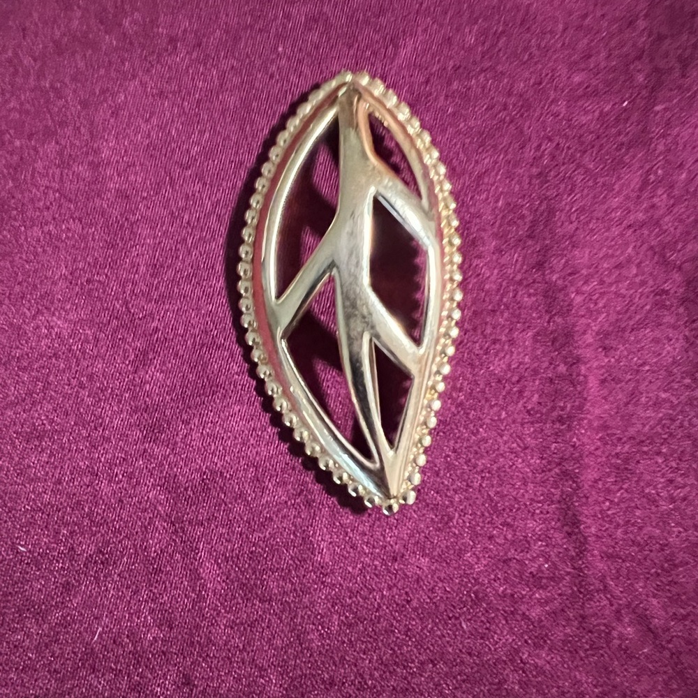 Beautiful vintage Monet brooch to be worn with a blazer sweater scarf